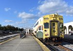 Sunrail Train # P329 departs Orlando Health / Amtrak Station with Bombardier Bilevel # 2006 in the lead